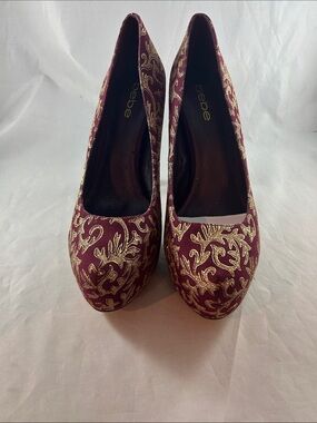 bebe Burgundy Platform Pumps with Gold Embroidered Detail